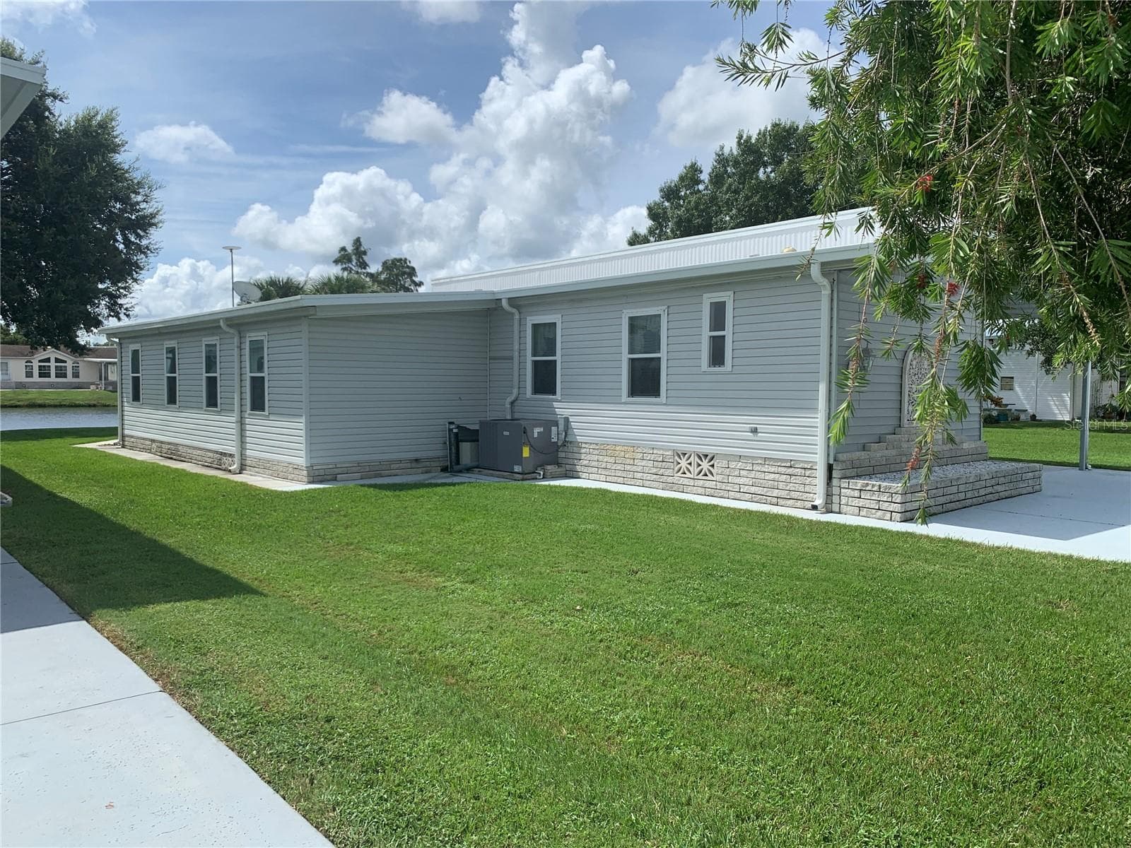 Manufactured Home at 4995 MOUNT OLIVE SHORES DR, POLK CITY, photo 5 of 75