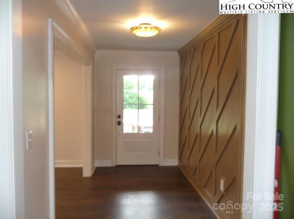 Entry with wood accent wall - 384 New River Heights, Boone