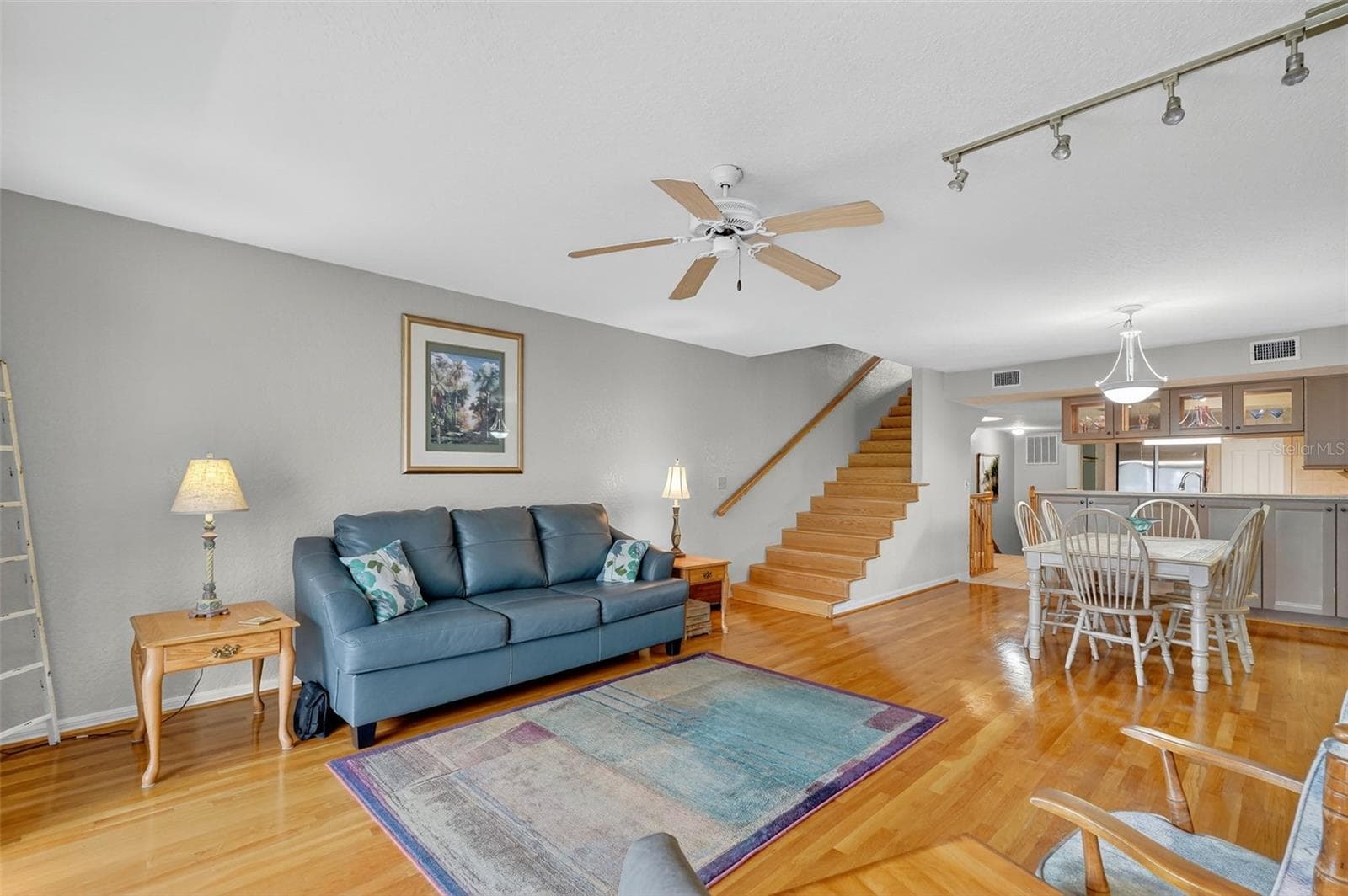 Living room opens to dining and kitchen for easy entertaining - 14879 SEMINOLE TRL, SEMINOLE