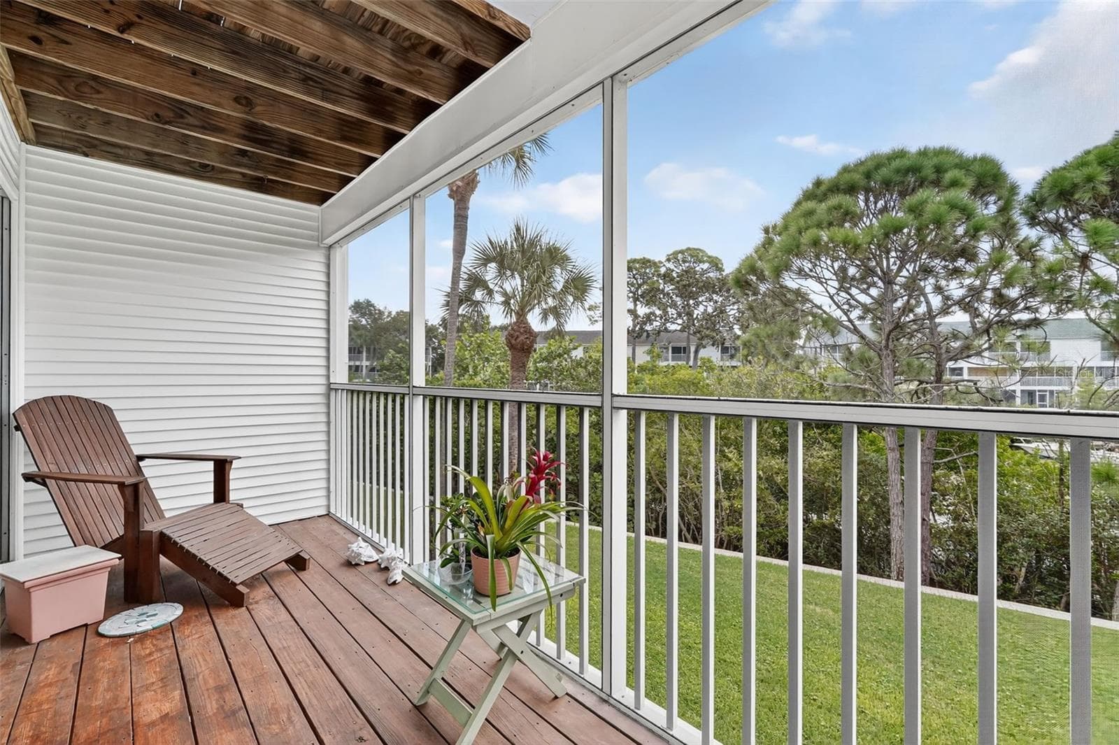 Second lanai view with peaceful waterfront setting - 14879 SEMINOLE TRL, SEMINOLE