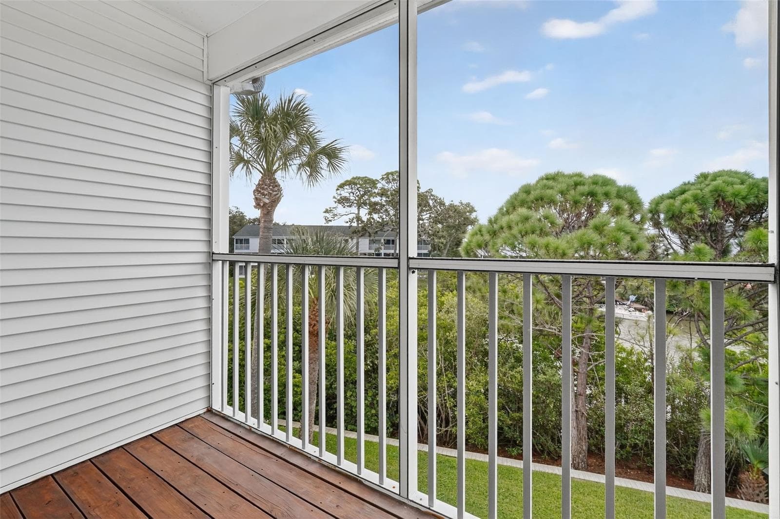 Private primary lanai with peaceful treetop and water views - 14879 SEMINOLE TRL, SEMINOLE