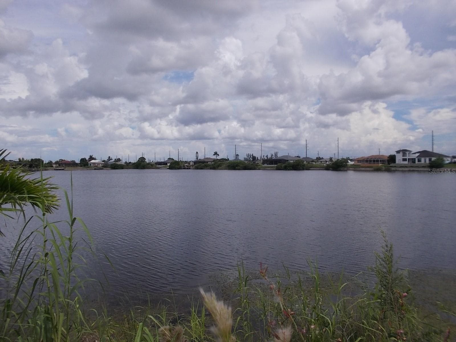 View of Carousel Lake - 538 NW 25TH TER, CAPE CORAL