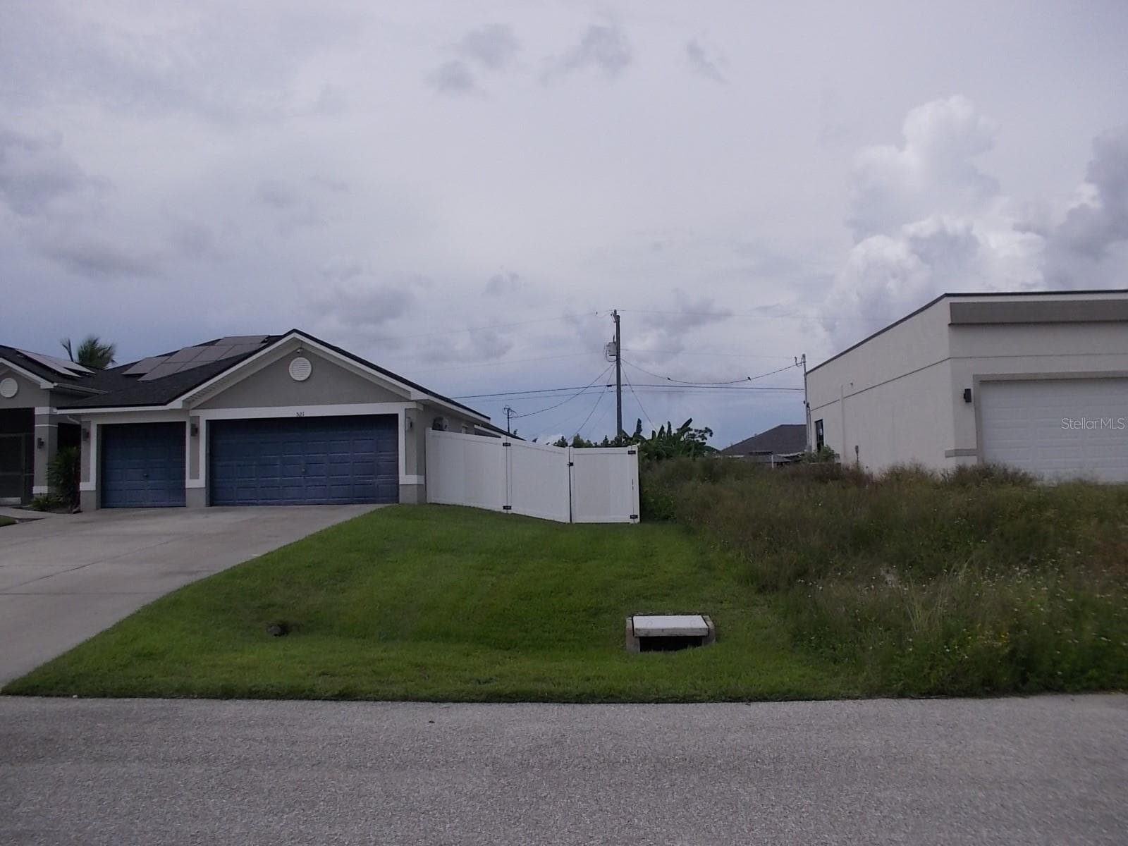 Looking across the street from the Lot - 538 NW 25TH TER, CAPE CORAL