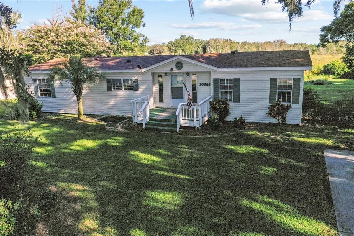 Manufactured Home at 10865 SE TIMUCUAN RD, SUMMERFIELD, photo 3 of 35