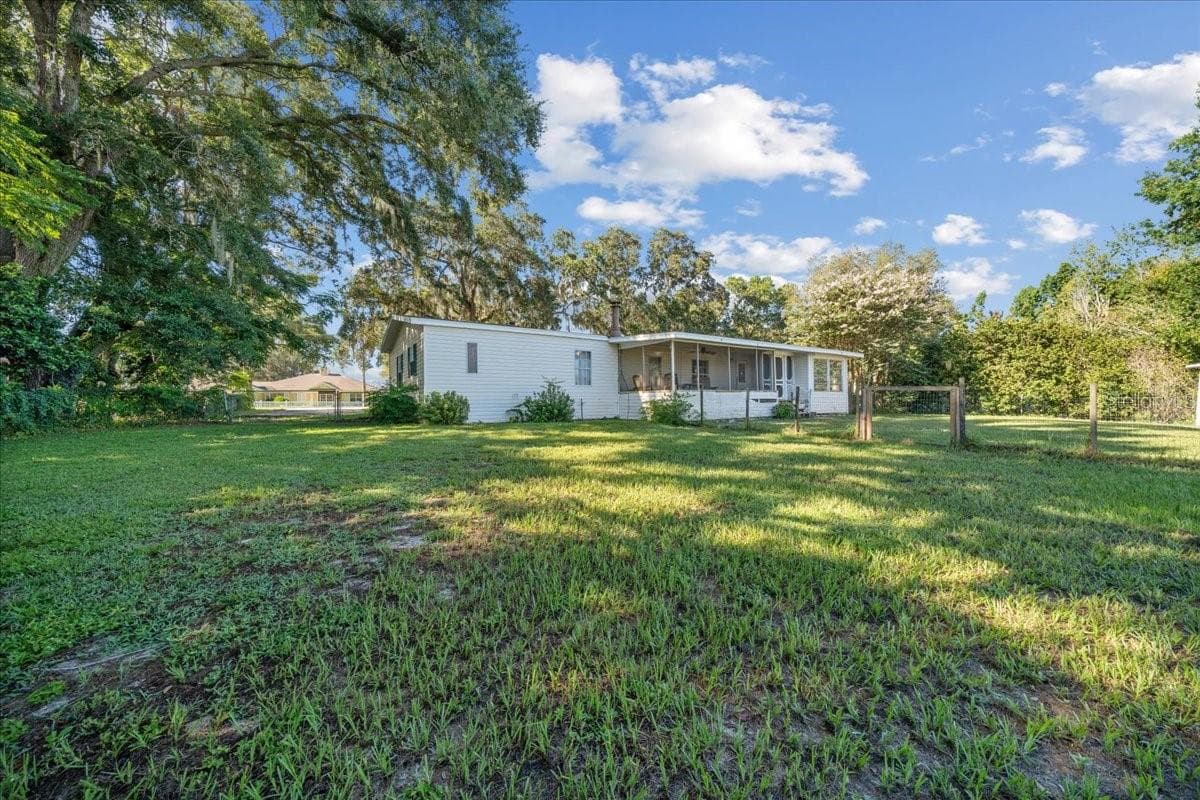 Manufactured Home at 10865 SE TIMUCUAN RD, SUMMERFIELD, photo 4 of 35