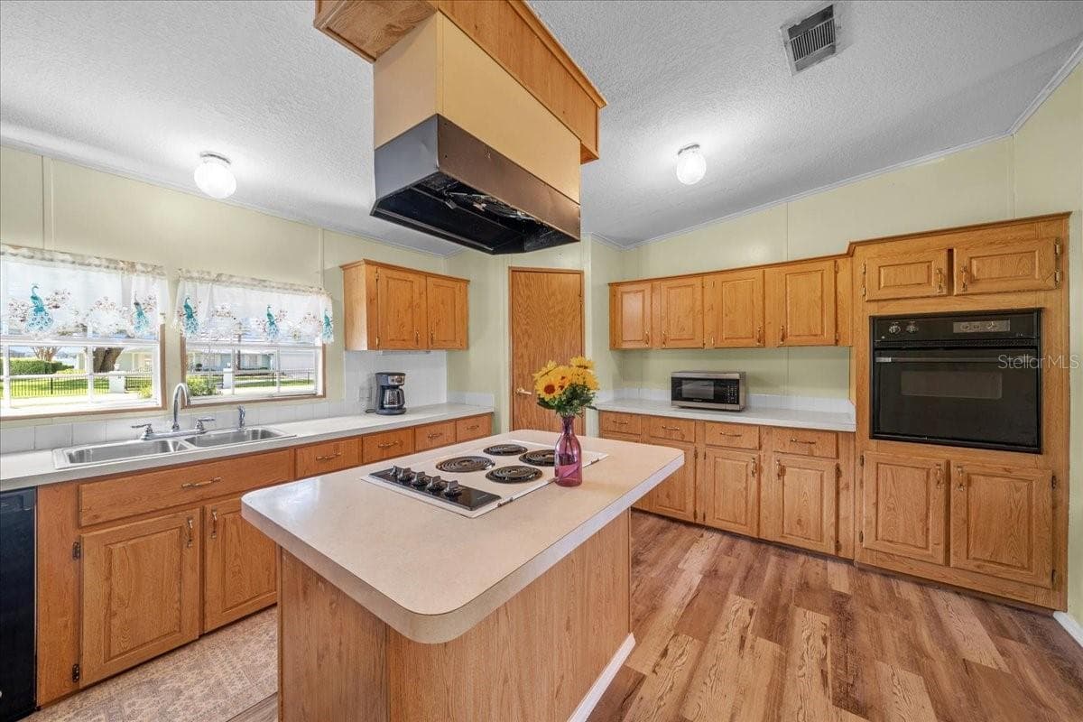 Manufactured Home at 10865 SE TIMUCUAN RD, SUMMERFIELD, photo 16 of 35