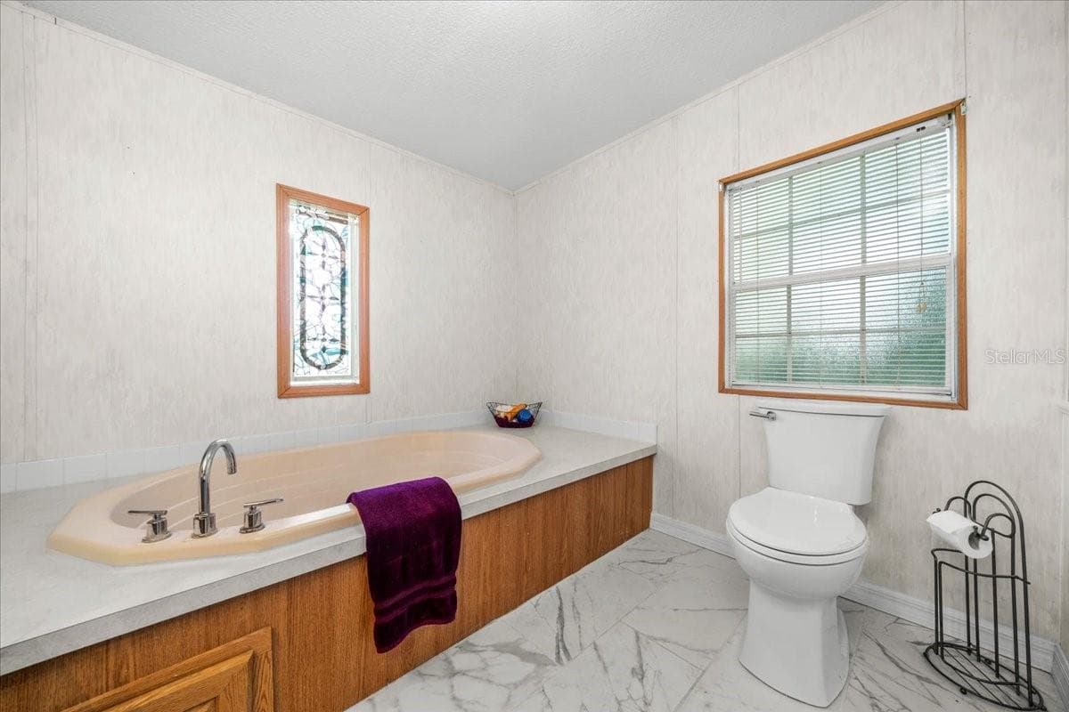 Manufactured Home at 10865 SE TIMUCUAN RD, SUMMERFIELD, photo 22 of 35