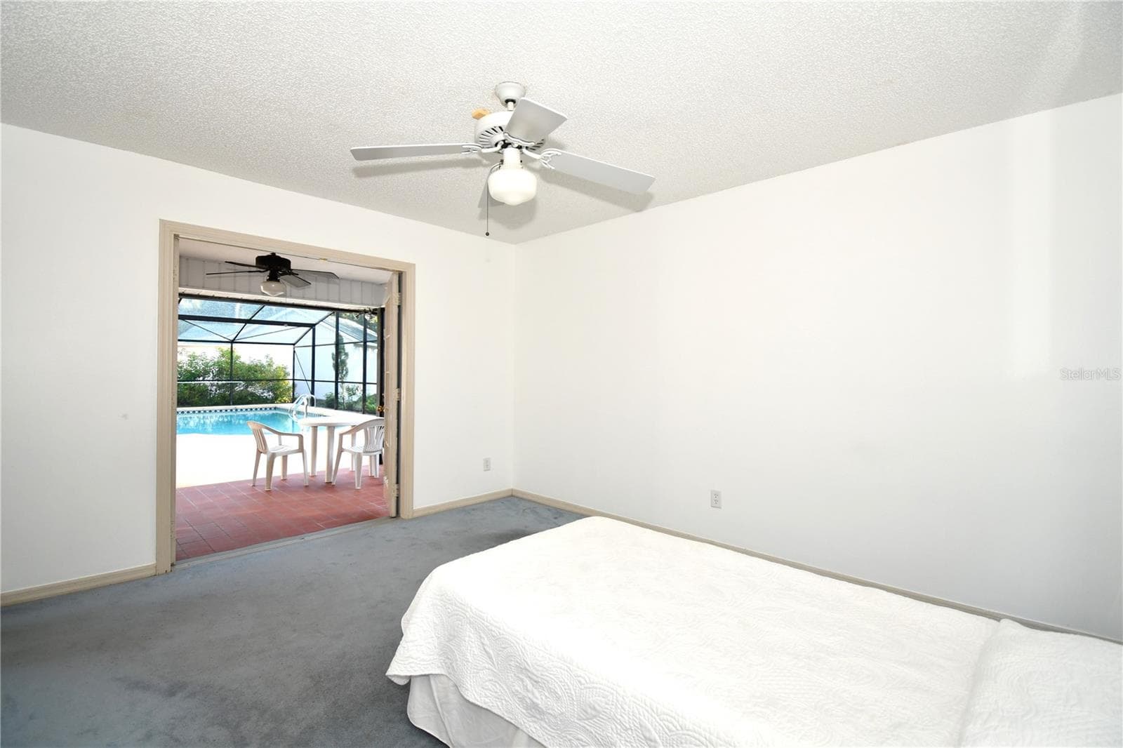 Bedroom with Pool Access - 611 OLD EUSTIS RD, MOUNT DORA