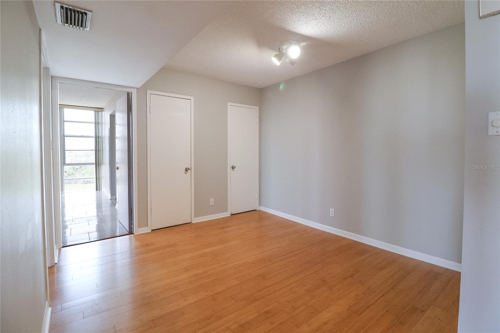 dining room has a coat closet and water heater closet. Could be converted to a laundry closet. - 7400 SUN ISLAND DR S #501, SOUTH PASADENA