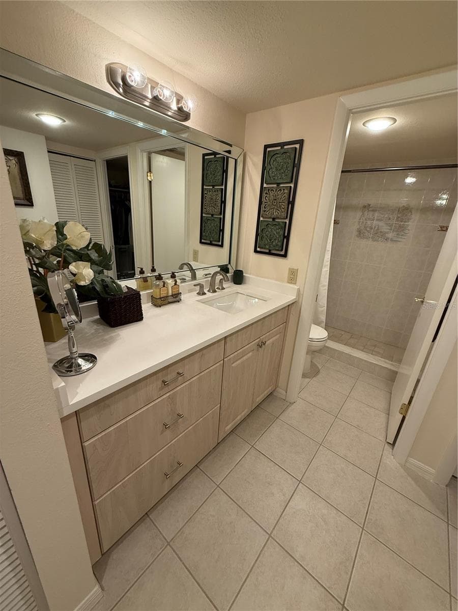 Vanity in Master Ba - with newly installed Counter Tops and sink - 1 KEY CAPRI #502E, TREASURE ISLAND