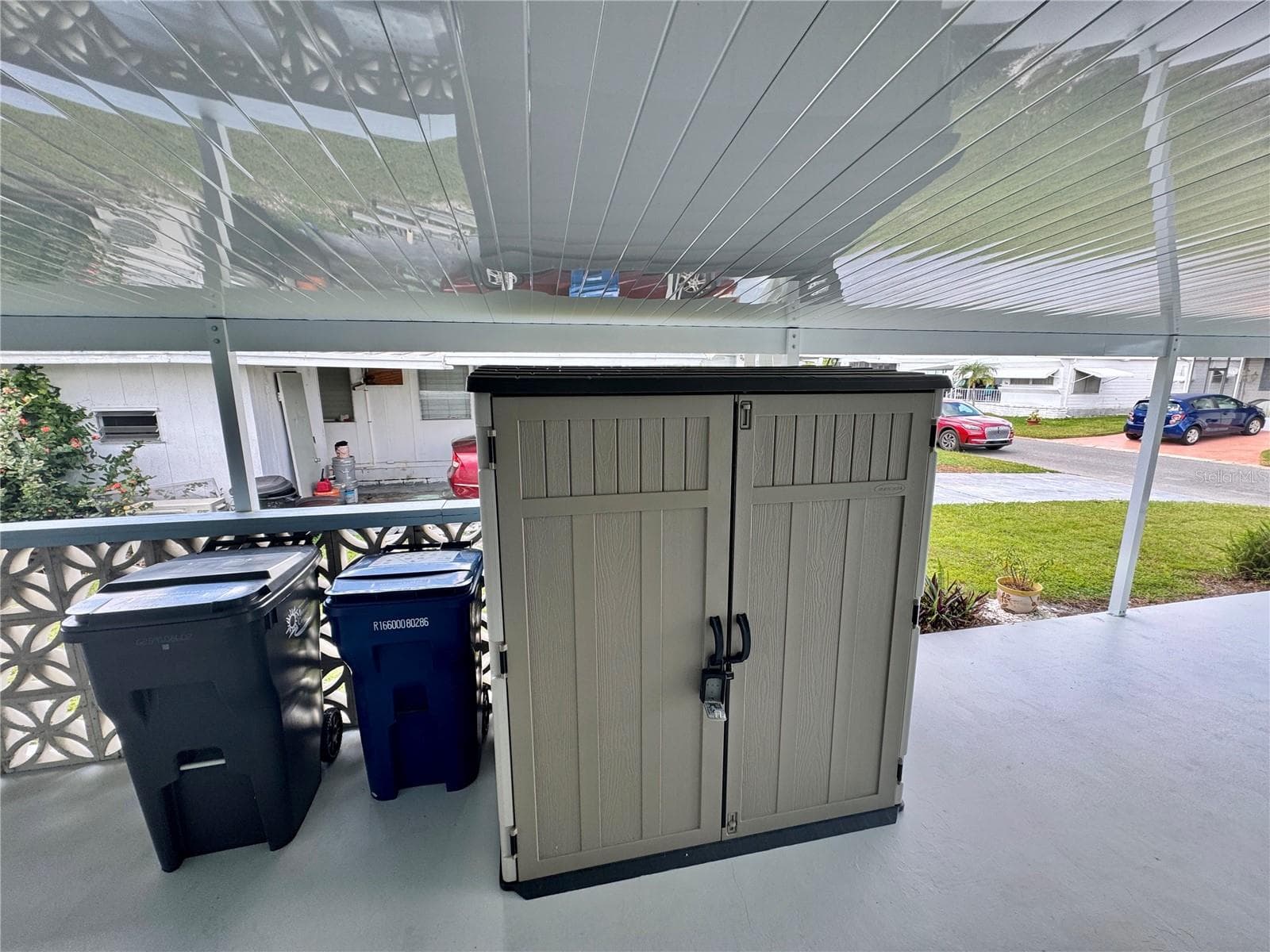 Shed on drive uner carport - 616 50TH AVENUE TER W, BRADENTON