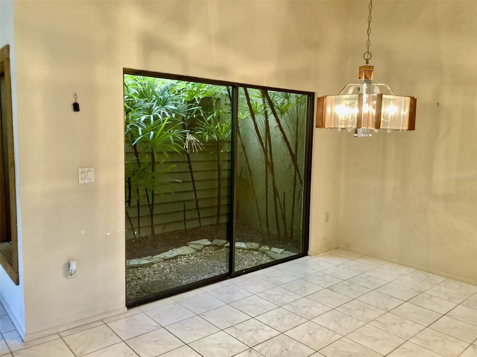 Atrium off dining room. - 3407 AVENIDA MADERA #A, BRADENTON