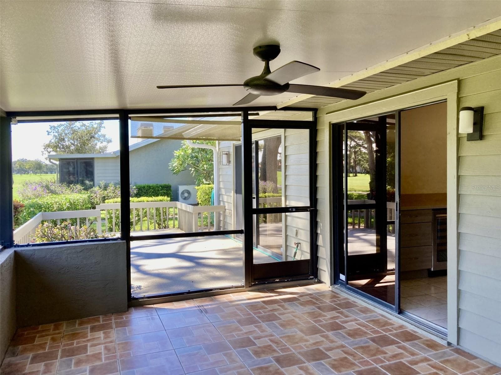 Porch off kitchen. - 3407 AVENIDA MADERA #A, BRADENTON
