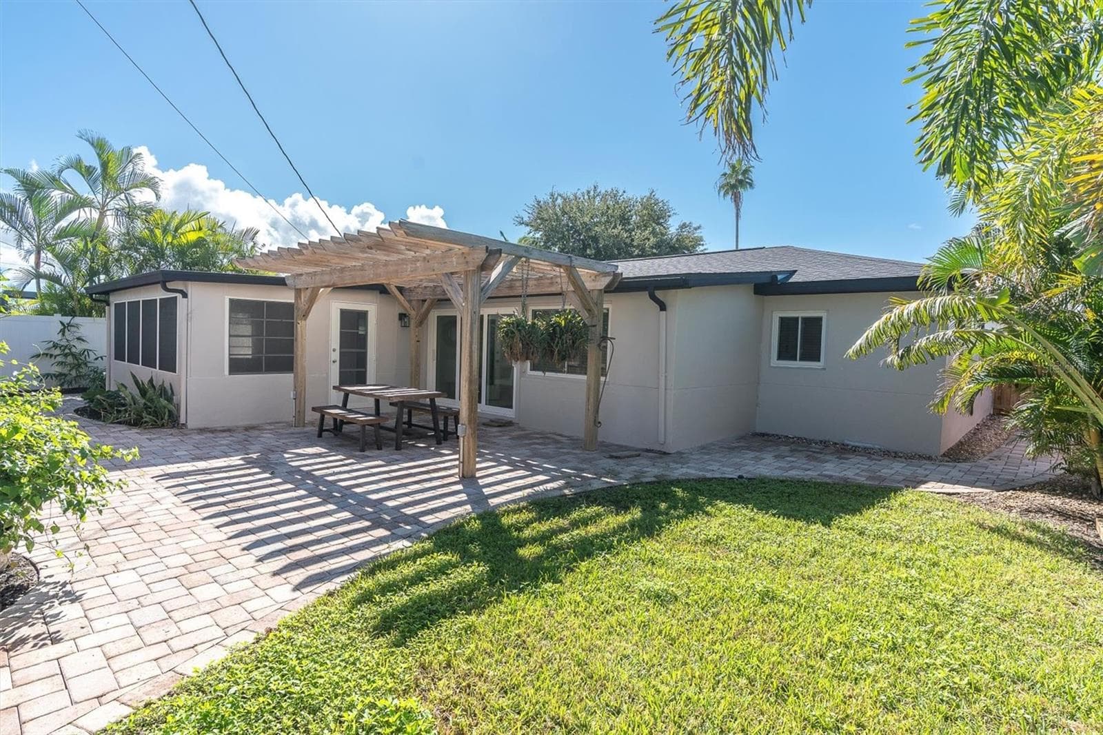 Backyard with Lawn Space - 197 LIDO DR, ST PETE BEACH