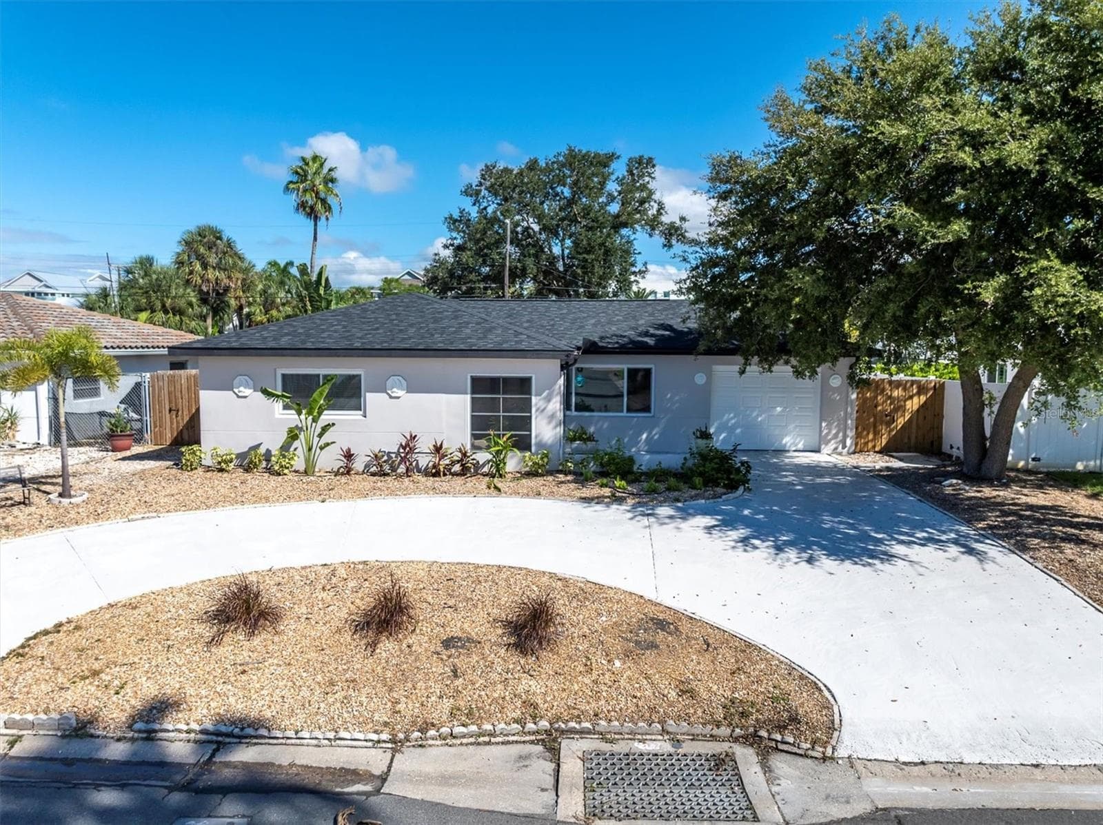 Welcoming Front View - 197 LIDO DR, ST PETE BEACH