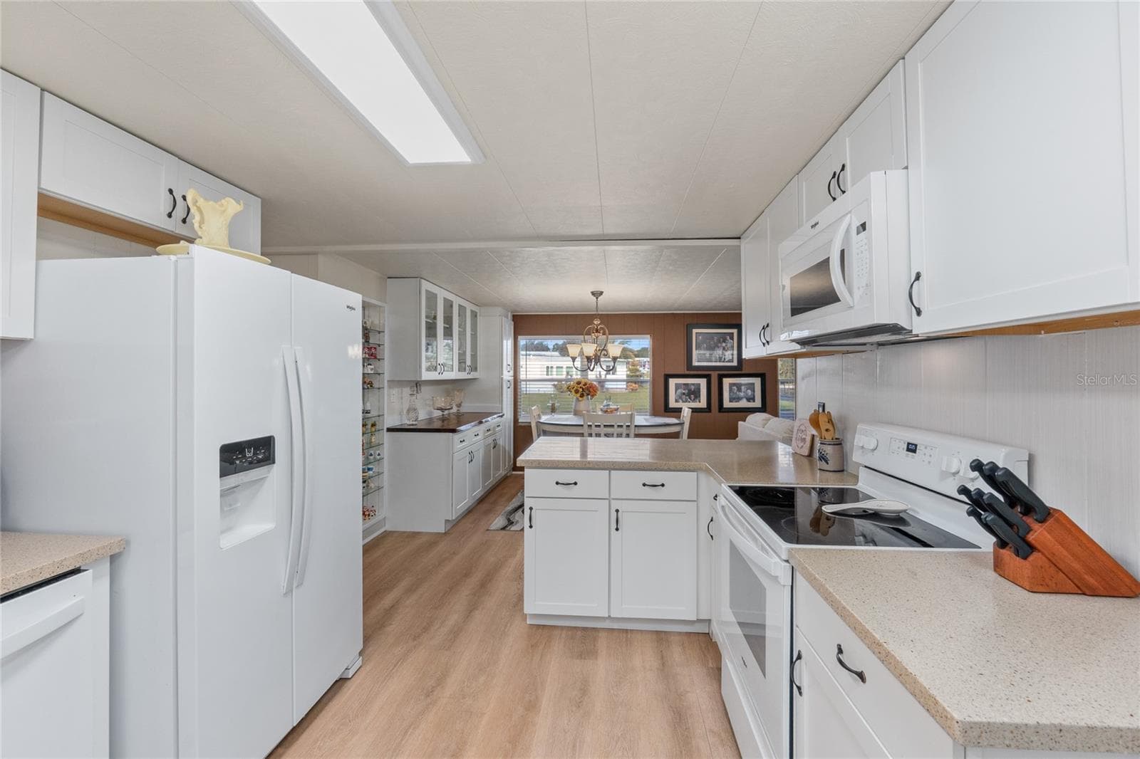 Fully remodeled Kitchen with new flooring, cabinets, countertops, appliances and fixtures - 288 SALEM AVE #3, PALM HARBOR