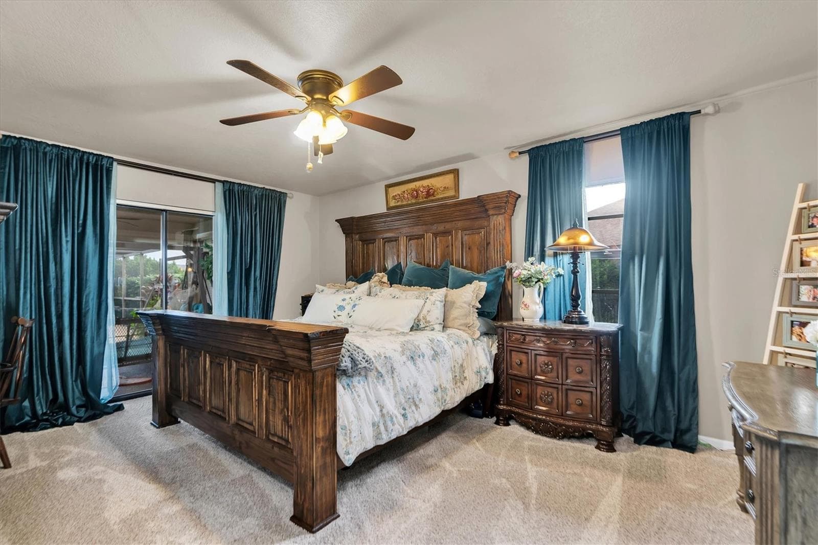 Primary bedroom has private access to covered lanai - 301 THORN HILL PL, SUN CITY CENTER