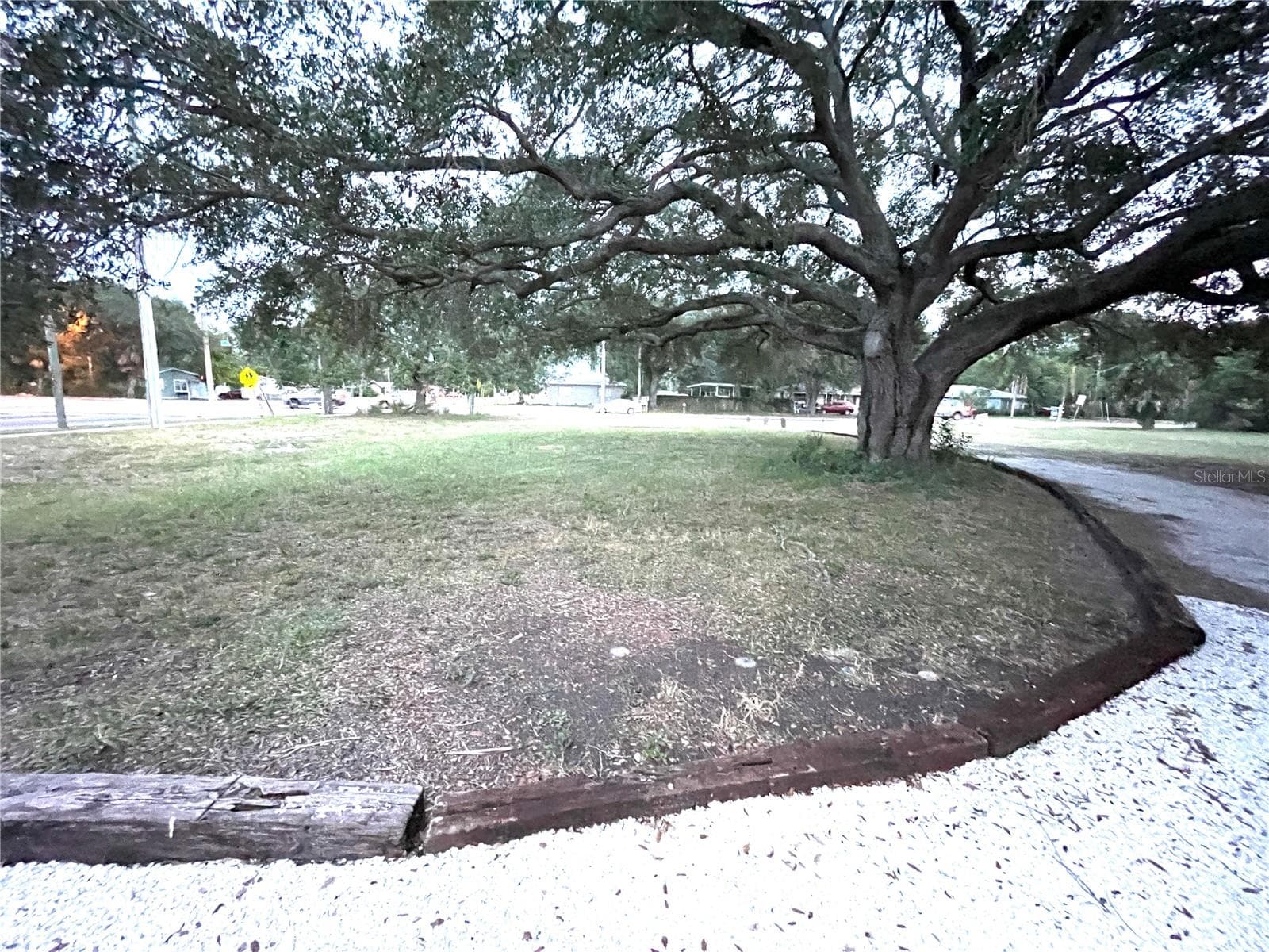 Looking towards 71st St. N. from the driveway behind the house - 5370 71ST ST N, ST PETERSBURG