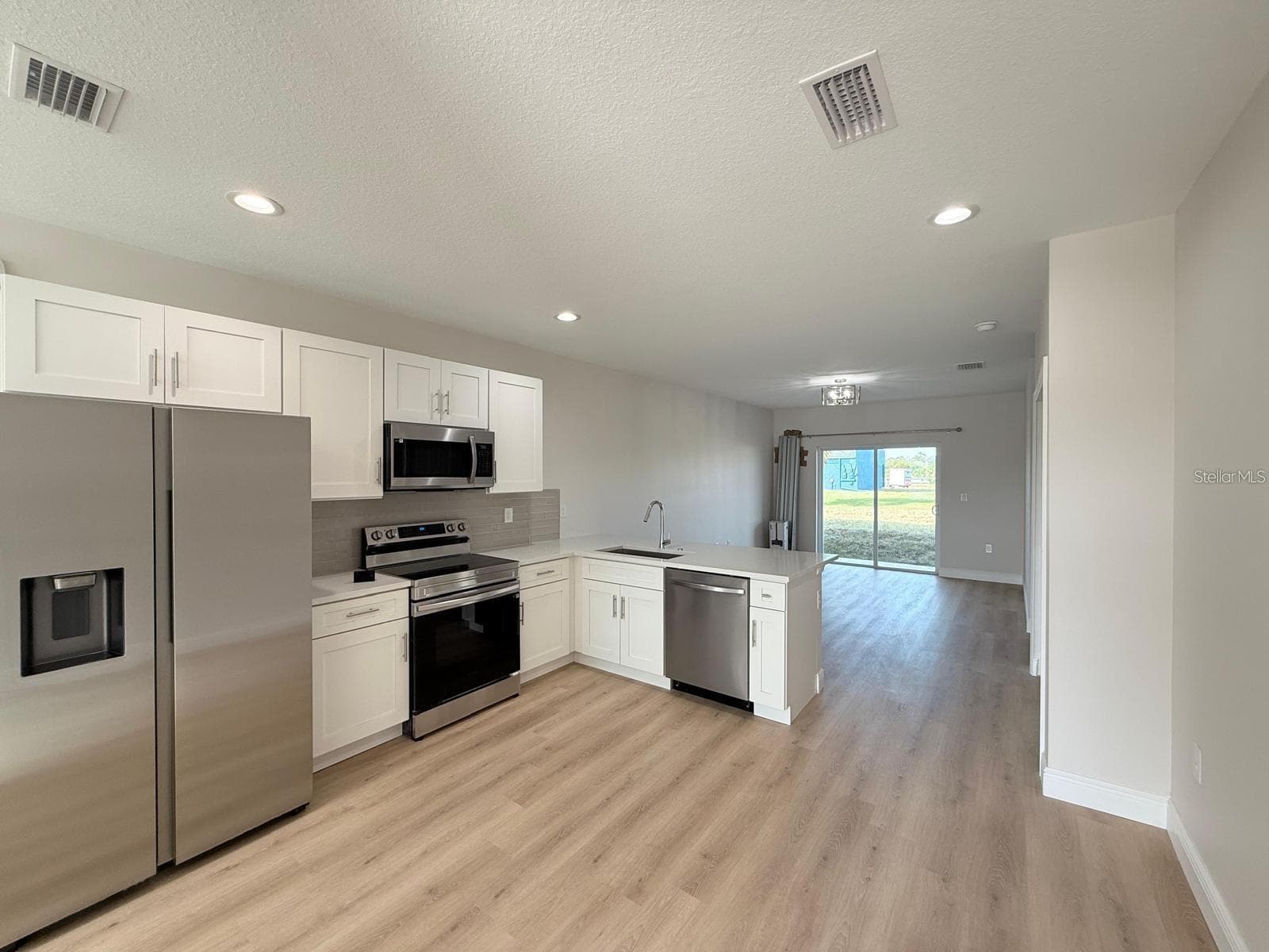 Example photo of the finished property. - 12231 KIRK AVE #2, PORT CHARLOTTE