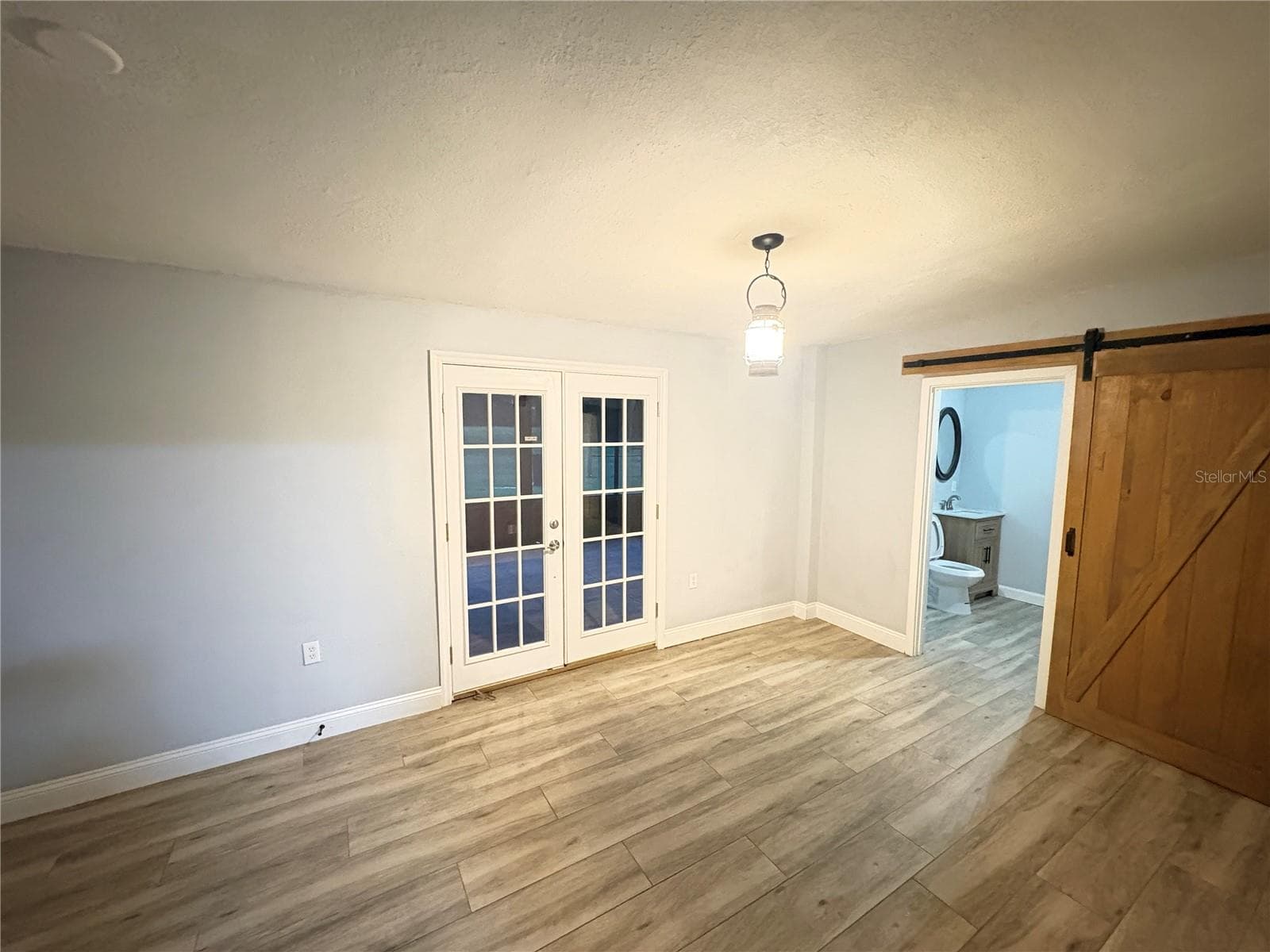 Family Room with French doors to Patio - 1722 NW 35 ST, OCALA