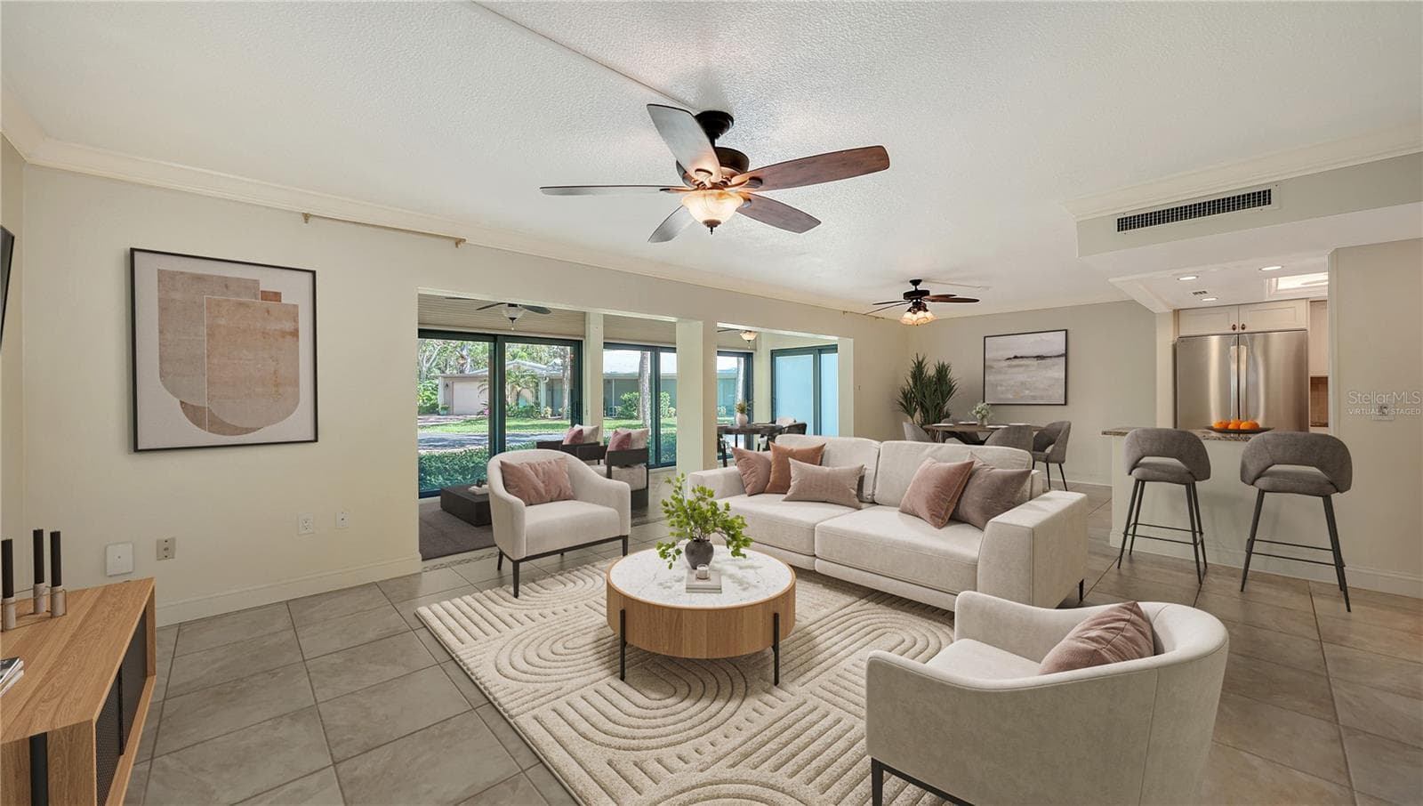 Virtually staged living and dining spaces. - 225 HOURGLASS WAY #103, SARASOTA