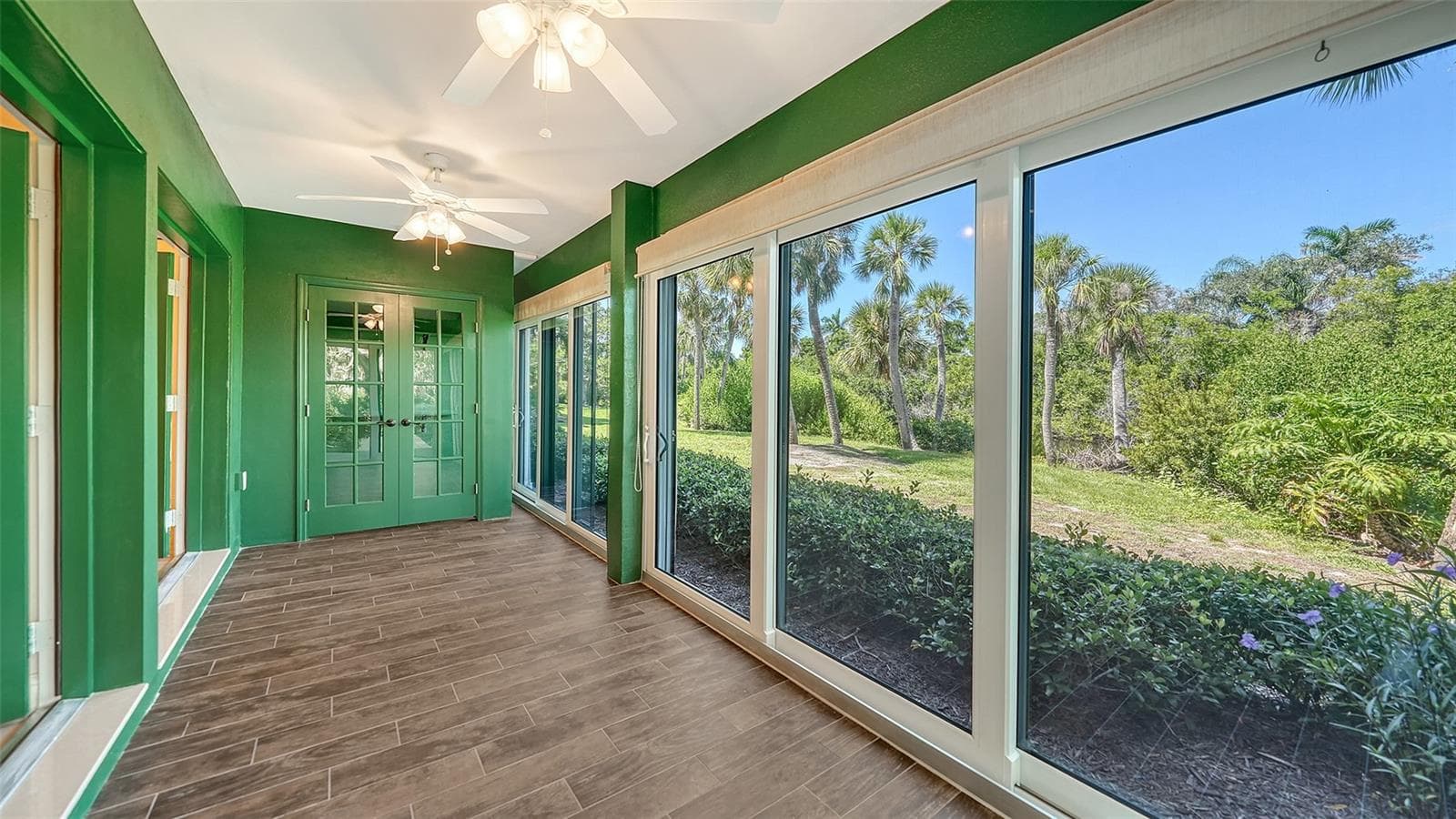 The enclosed lanai offers full 180 degree views of the shimmering lagoon. - 225 HOURGLASS WAY #103, SARASOTA