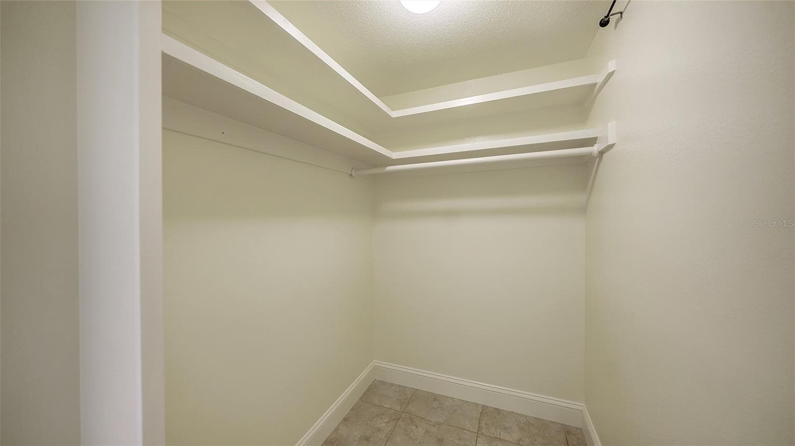 Walk-in closet. - 225 HOURGLASS WAY #103, SARASOTA