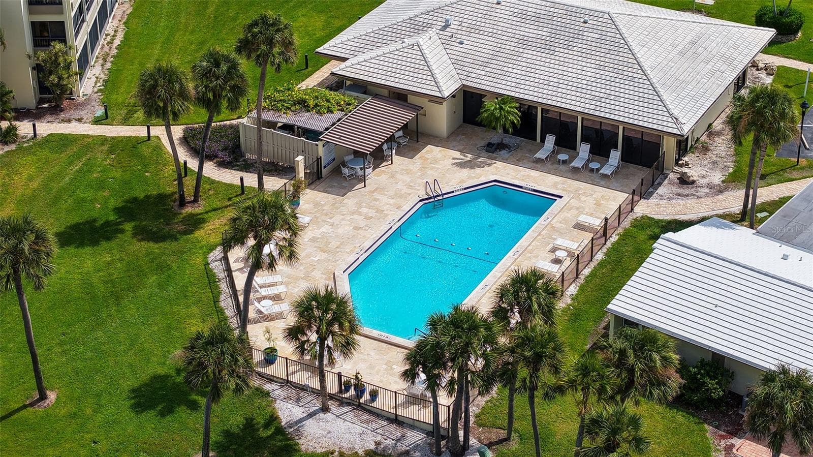 Clubhouse lap pool. - 225 HOURGLASS WAY #103, SARASOTA