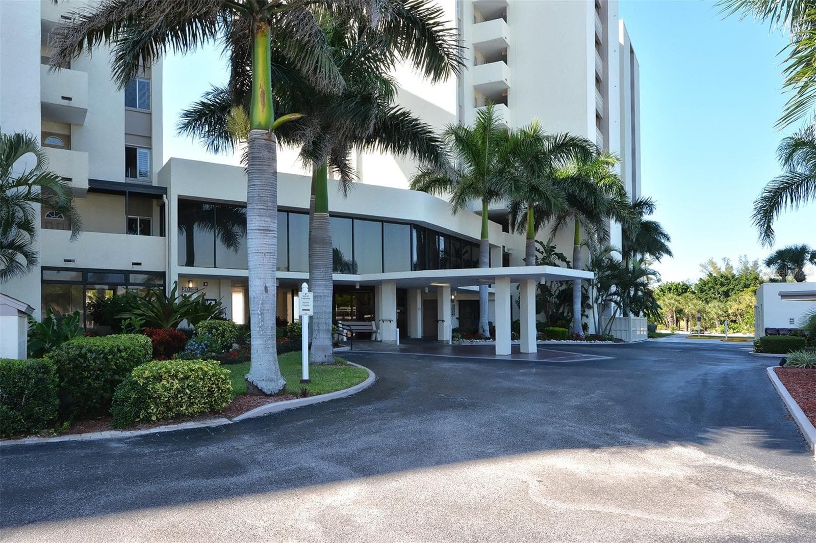 Entrance to the Whispering Sands beach through the tower buildings. - 225 HOURGLASS WAY #103, SARASOTA