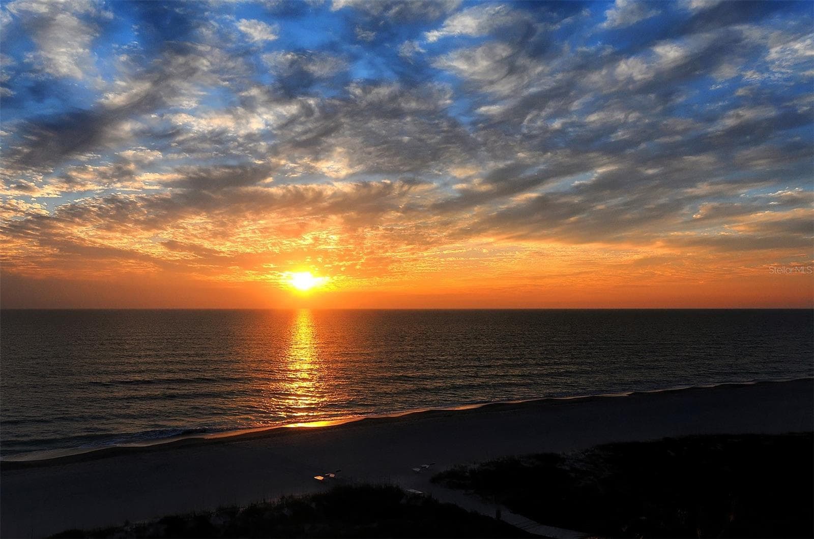 Sunset over the Gulf on the Whispering Sands beach! - 225 HOURGLASS WAY #103, SARASOTA