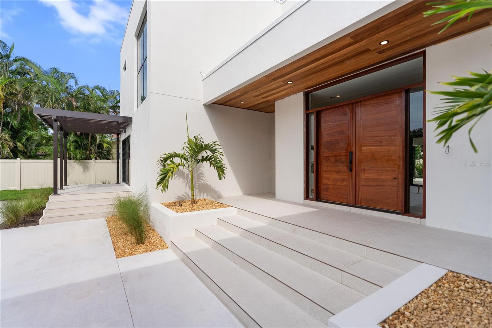 Locally handcrafted African Sapele wood entry door - 1759 WALDEMERE ST, SARASOTA