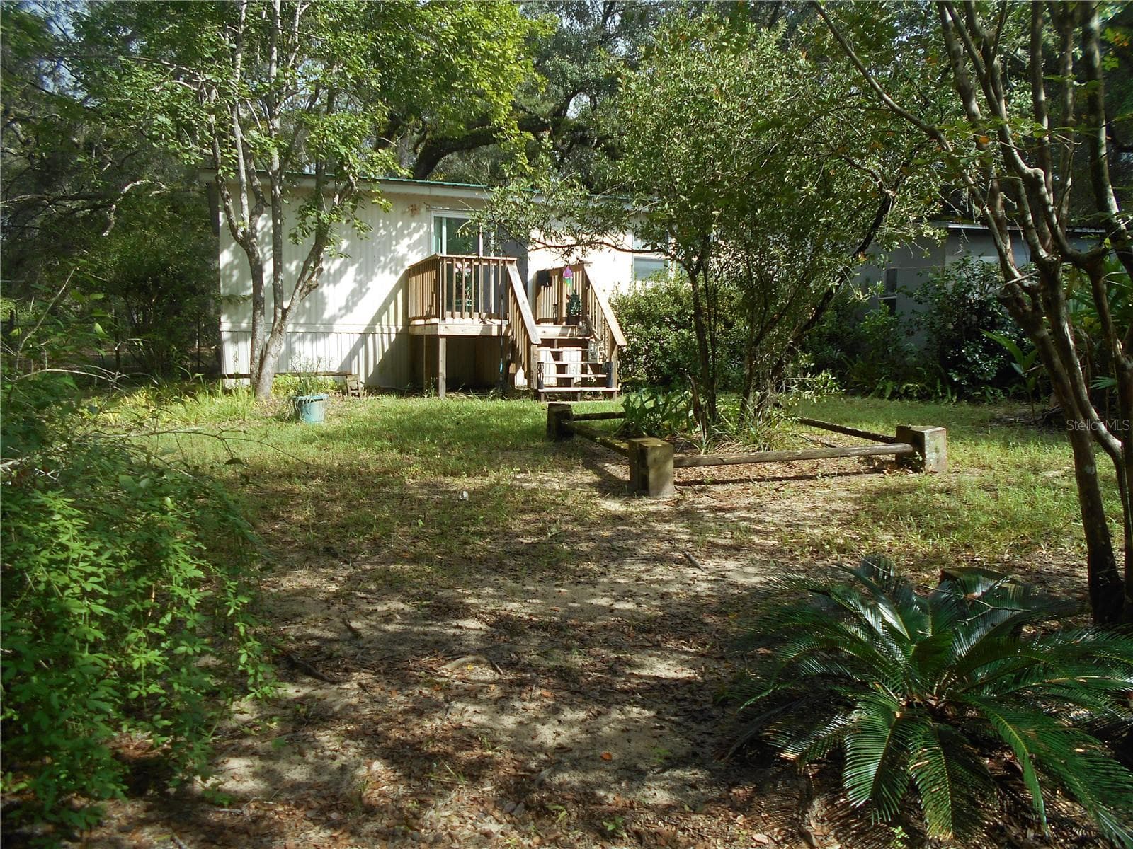 BACK VIEW/ PROPERTY GOES FROM STREET TO STREET - 20425 NE 143RD ST, SALT SPRINGS