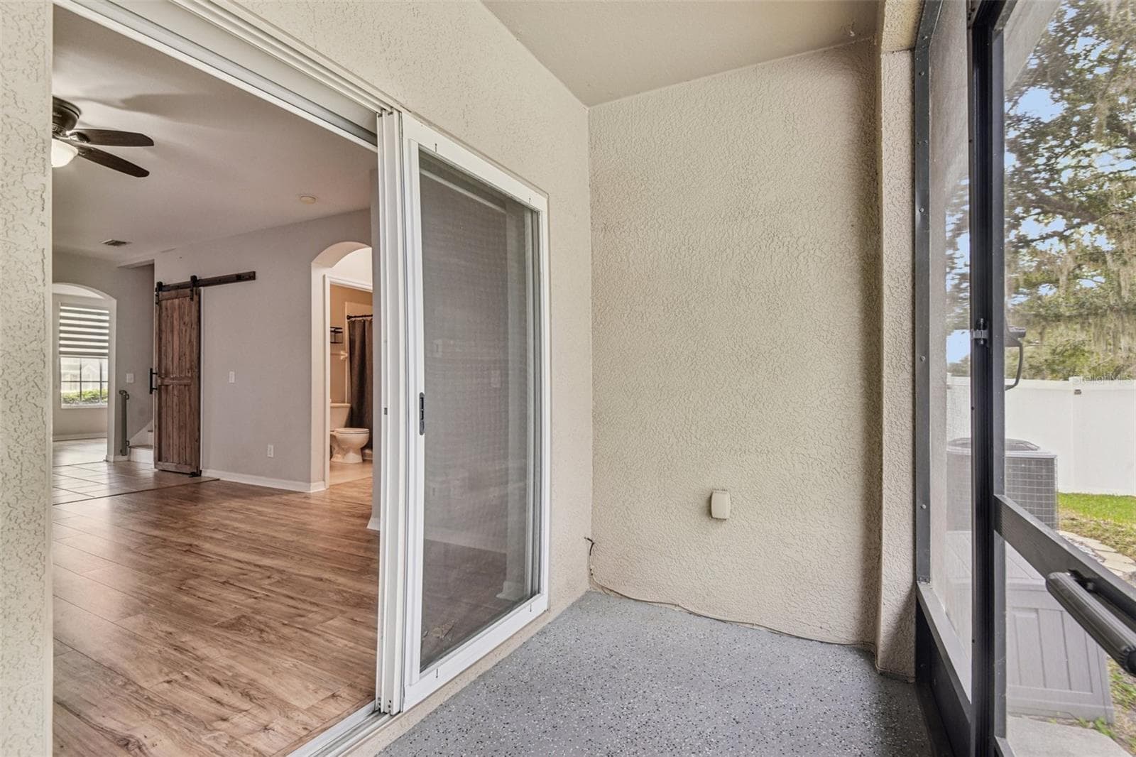 screened in patio - 3314 BROKEN BOW DR, LAND O LAKES