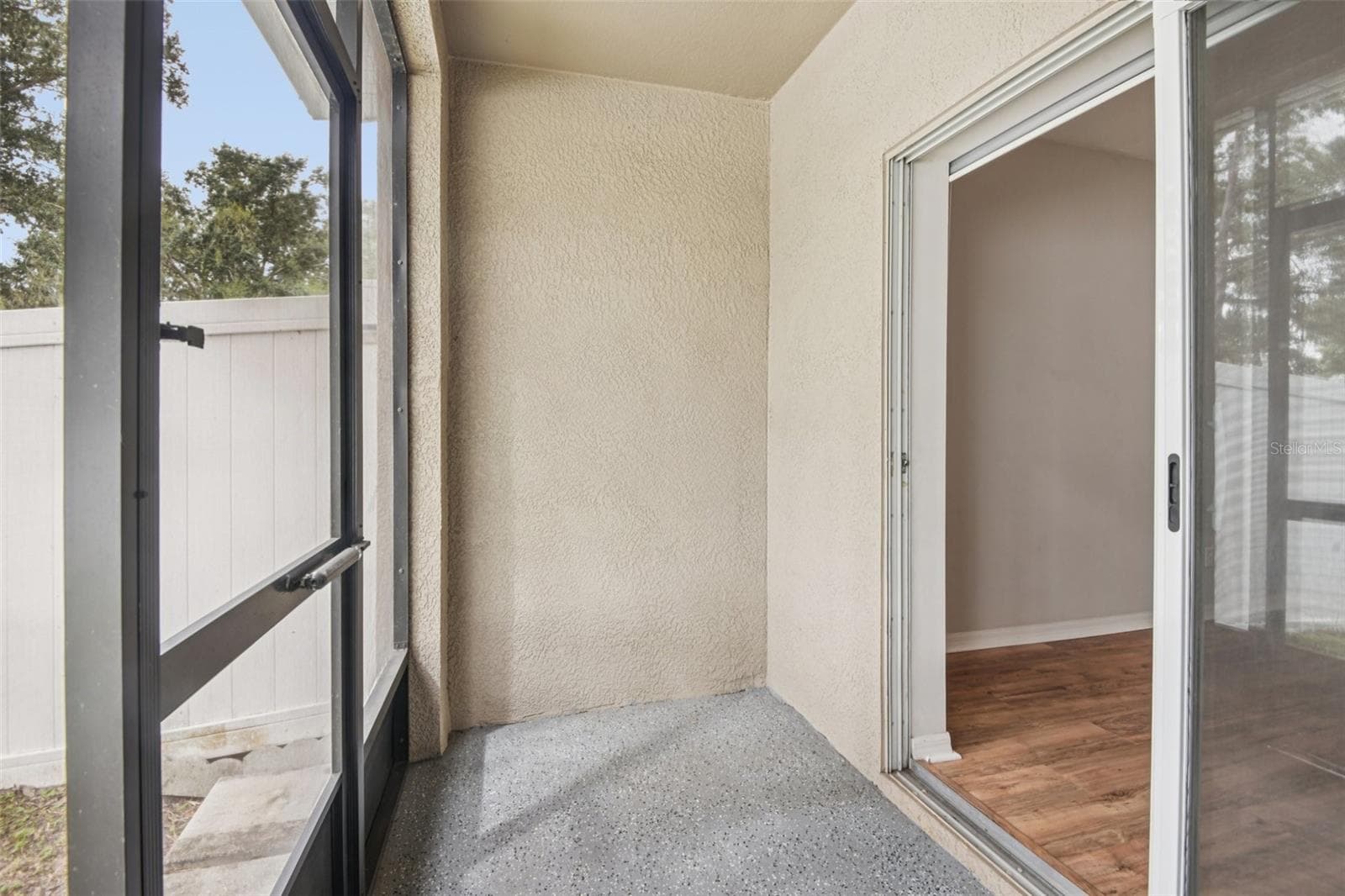 screened in patio - 3314 BROKEN BOW DR, LAND O LAKES
