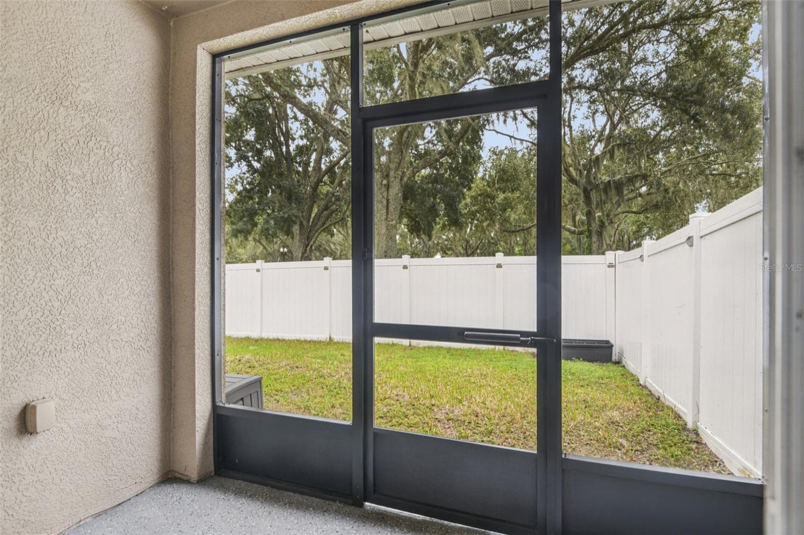 screened in patio - 3314 BROKEN BOW DR, LAND O LAKES