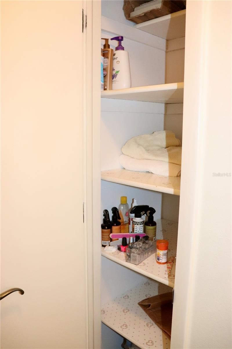 Hall linen closet - 6990 VERSAILLES N #6990, PINELLAS PARK