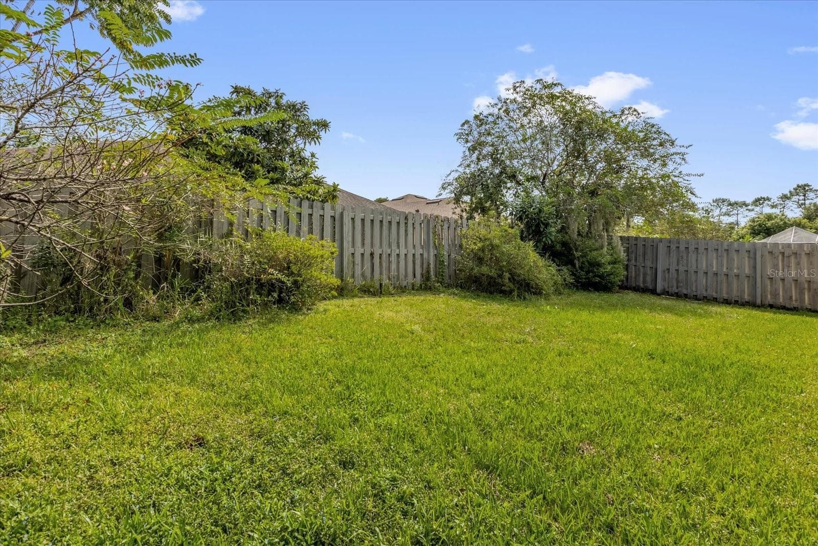 Fenced Backyard - 5653 MAGNOLIA BLOOM TER, OVIEDO