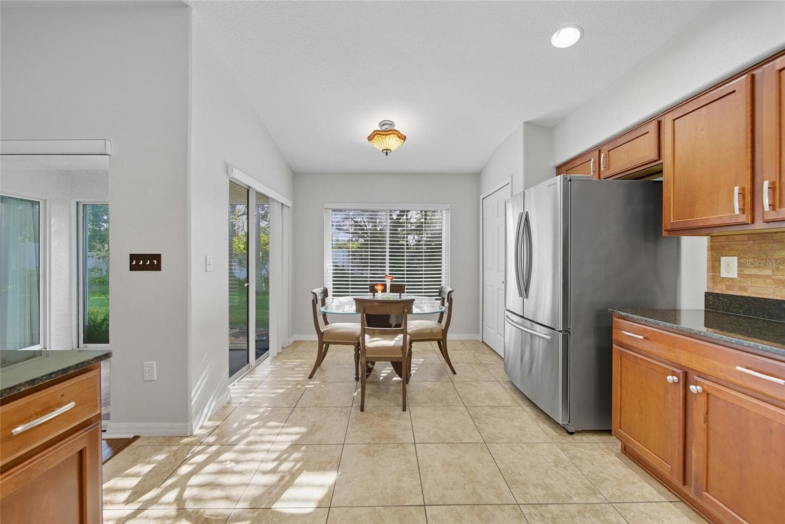 Kitchen with stainless steel appliances - 9427 ROLLING CIR, SAN ANTONIO