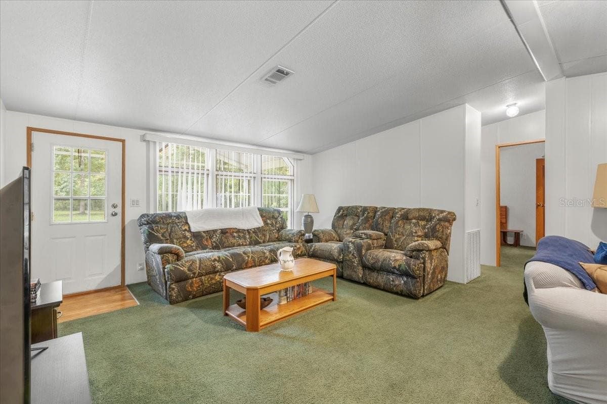 Living Room with wood burning fireplace! - 1549 NE 642ND ST, OLD TOWN
