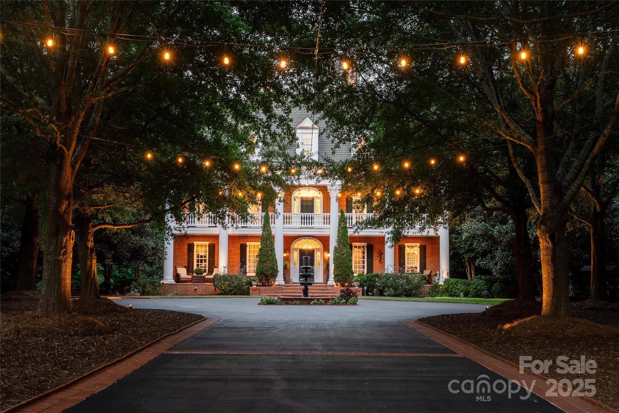 Beautiful tree lined, landscaped and illuminated entrance. - 2665 Rolling Hills Drive, Monroe