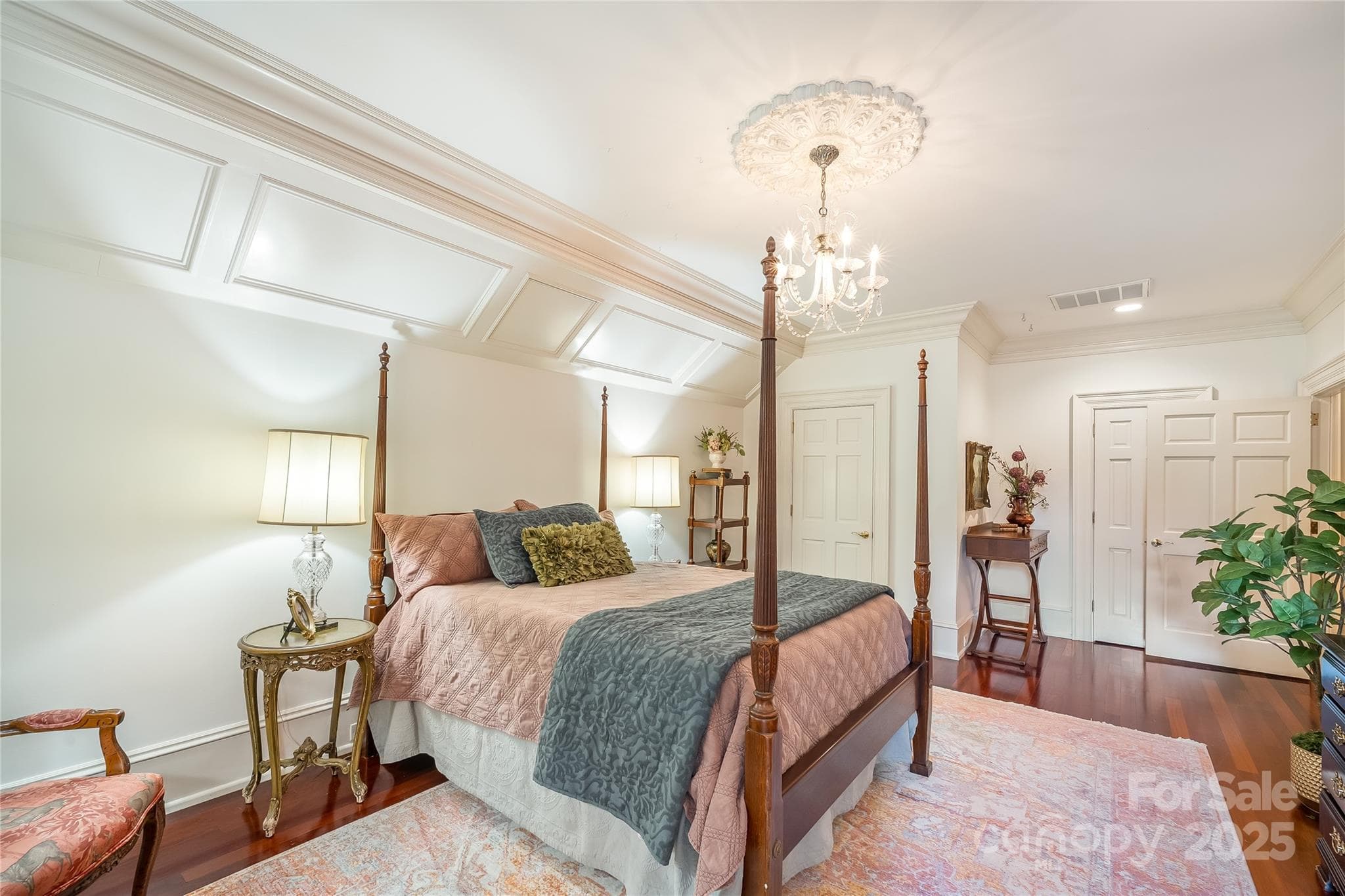 One of two suites on the third level. Offering walk in closets and the gleaming hardwoods. - 2665 Rolling Hills Drive, Monroe
