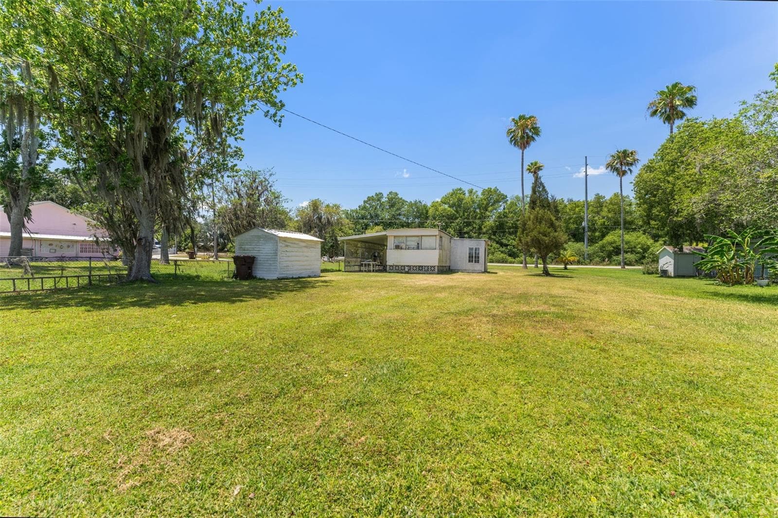 Storage Shed in the back Yard! - 7558 BERKLEY RD, POLK CITY
