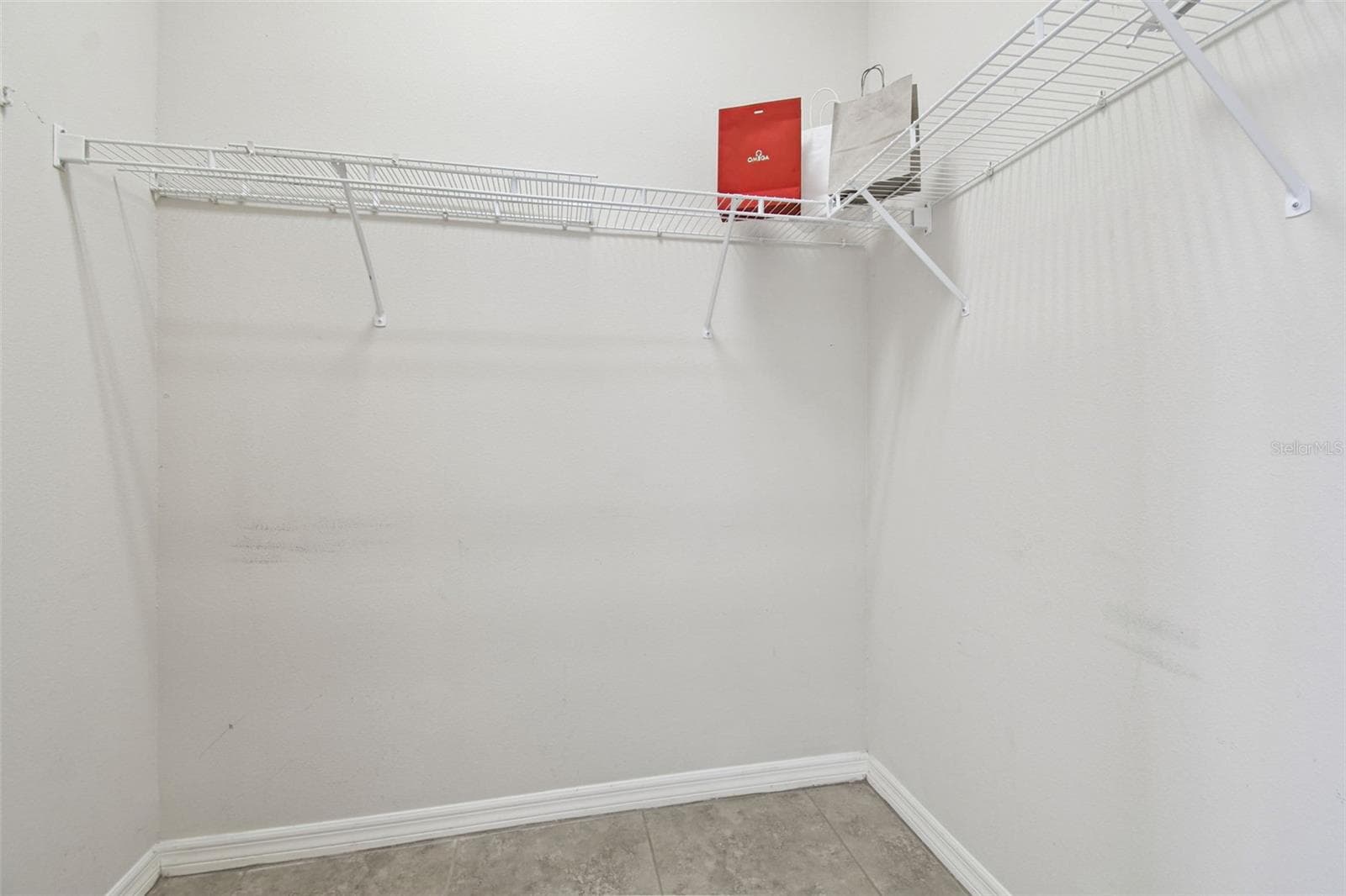 Walk in closet #1 - 15639 SETH COUNTRY LN, WIMAUMA