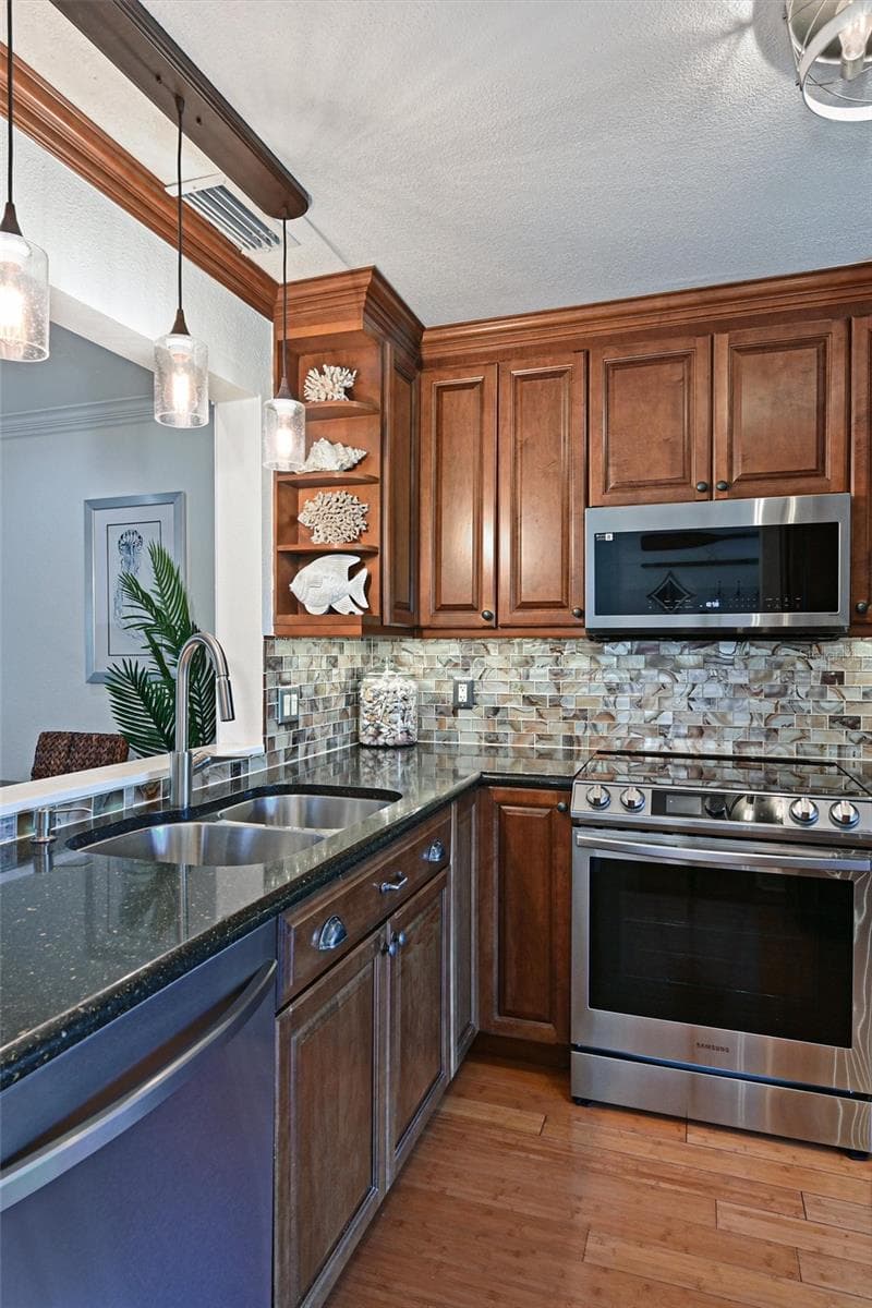 Dual Sinks, Induction Stove with Air Fryer - 10313 WATERBIRD WAY, BRADENTON