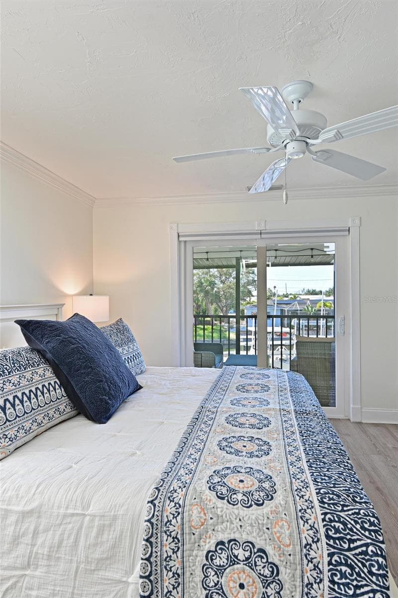 Primary Bedroom w/View to Canal - 10313 WATERBIRD WAY, BRADENTON