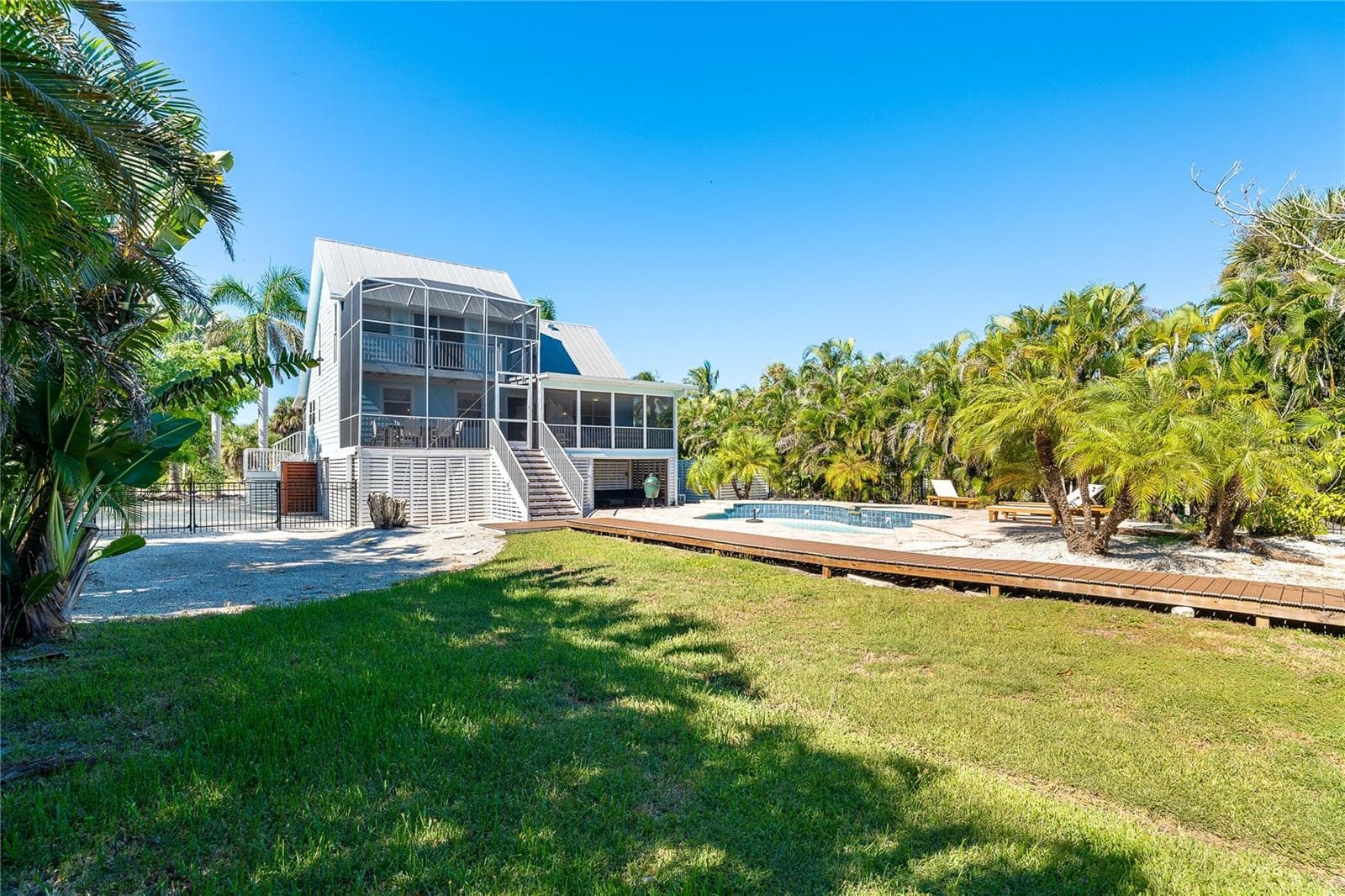 Backyard and rear of house. - 260 KETTLE HARBOR DR, PLACIDA