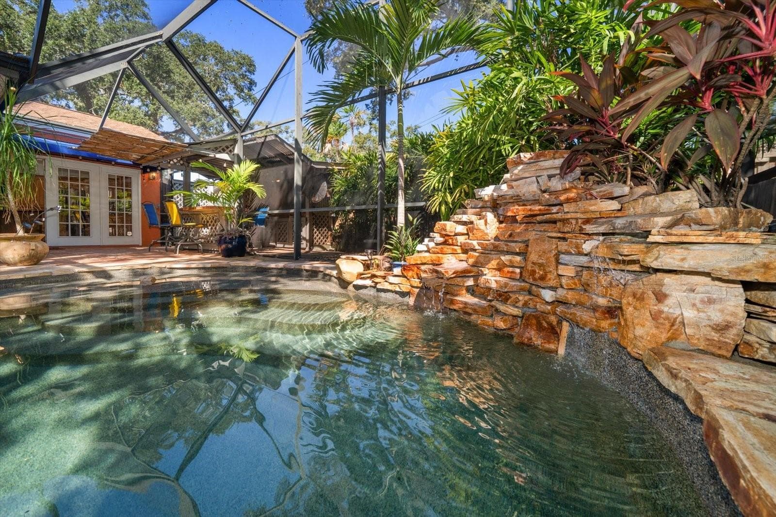 SALT WATER POOL WITH SUNSHELF AND WATERFALL - 3033 82ND WAY N, ST PETERSBURG