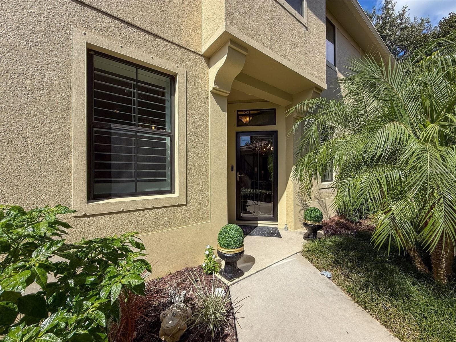 Front door to your new home - 2539 SILVERBACK CT, PALM HARBOR