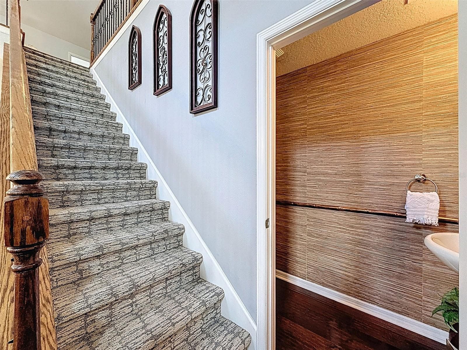 Stairs to second floor - 2539 SILVERBACK CT, PALM HARBOR