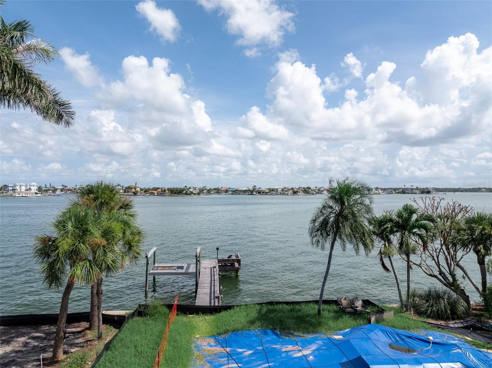 This Intracoastal Lot has 85' of Waterfrontage with an existing dock.  The deep pool and spa are a gift with a purchase! - 2 PARADISE LN, TREASURE ISLAND